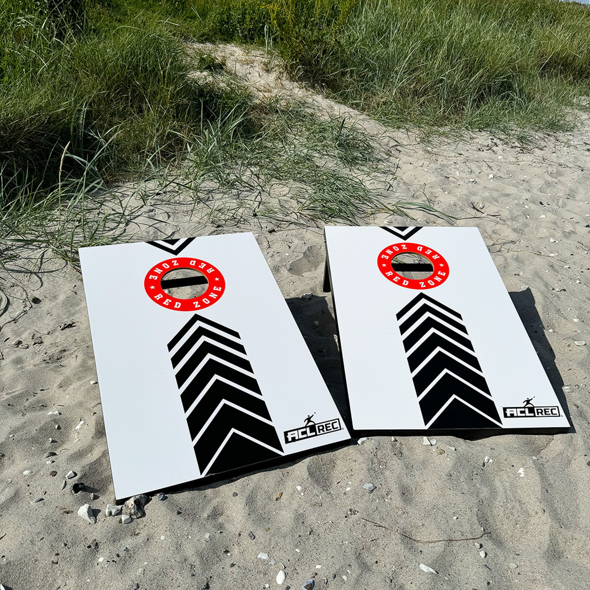 Redzone cornholespil på strand i sand cornhole